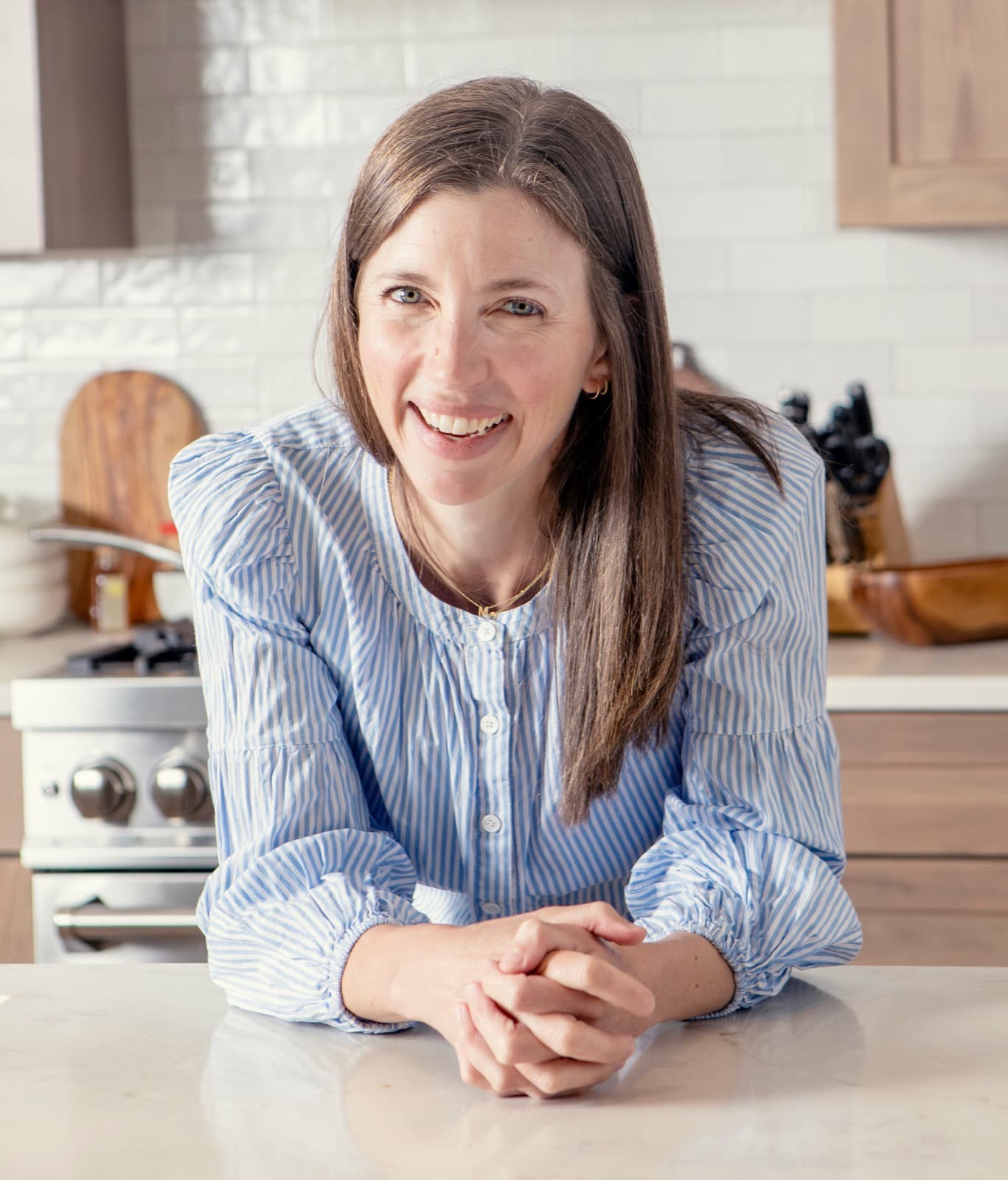 Chef Lauren Lobley smiling in her kitchen
